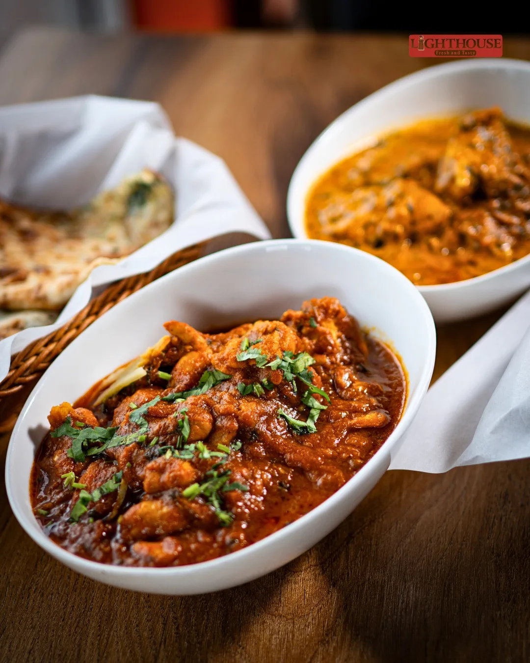 Freshly prepared Indian curry garnished with coriander